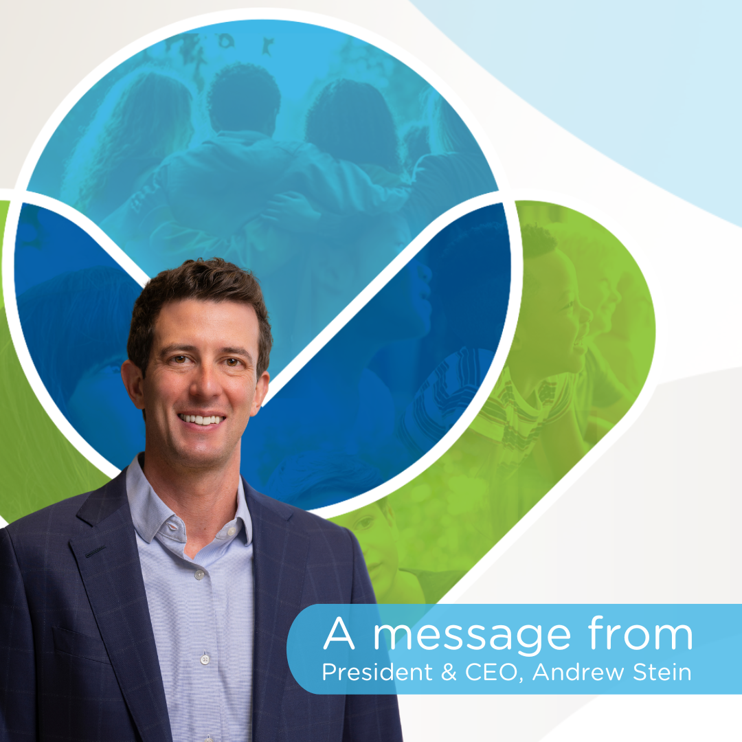 A man in a blazer smiles in front of an abstract background with blue and green tones, featuring people and nature. Text reads: "A message from President & CEO, Andrew Stein.