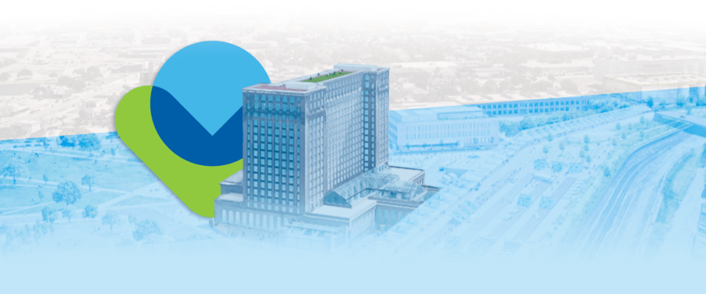 A large modern hotel building sits in the center, reminiscent of Michigan Central Station, with a blue and green location pin graphic behind it, set against a faded, aerial cityscape background.