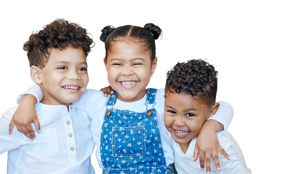 Three young children smiling and hugging each other. The children wear casual clothes: two boys in white shirts and a girl in a blue denim dress with her hair in buns. The background is light with a subtle line design.